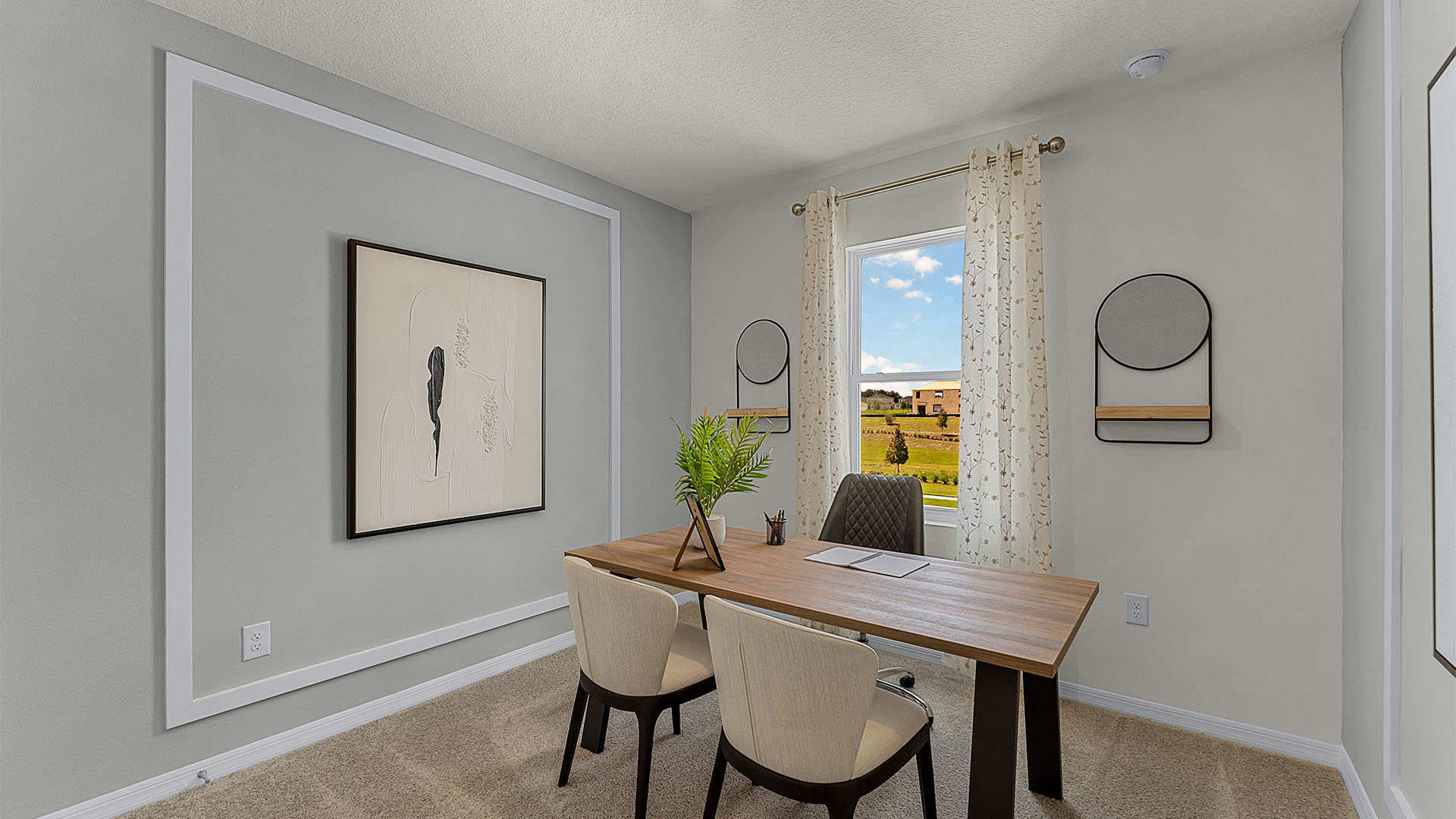 Functional home office with desk, chairs and space to work or play.