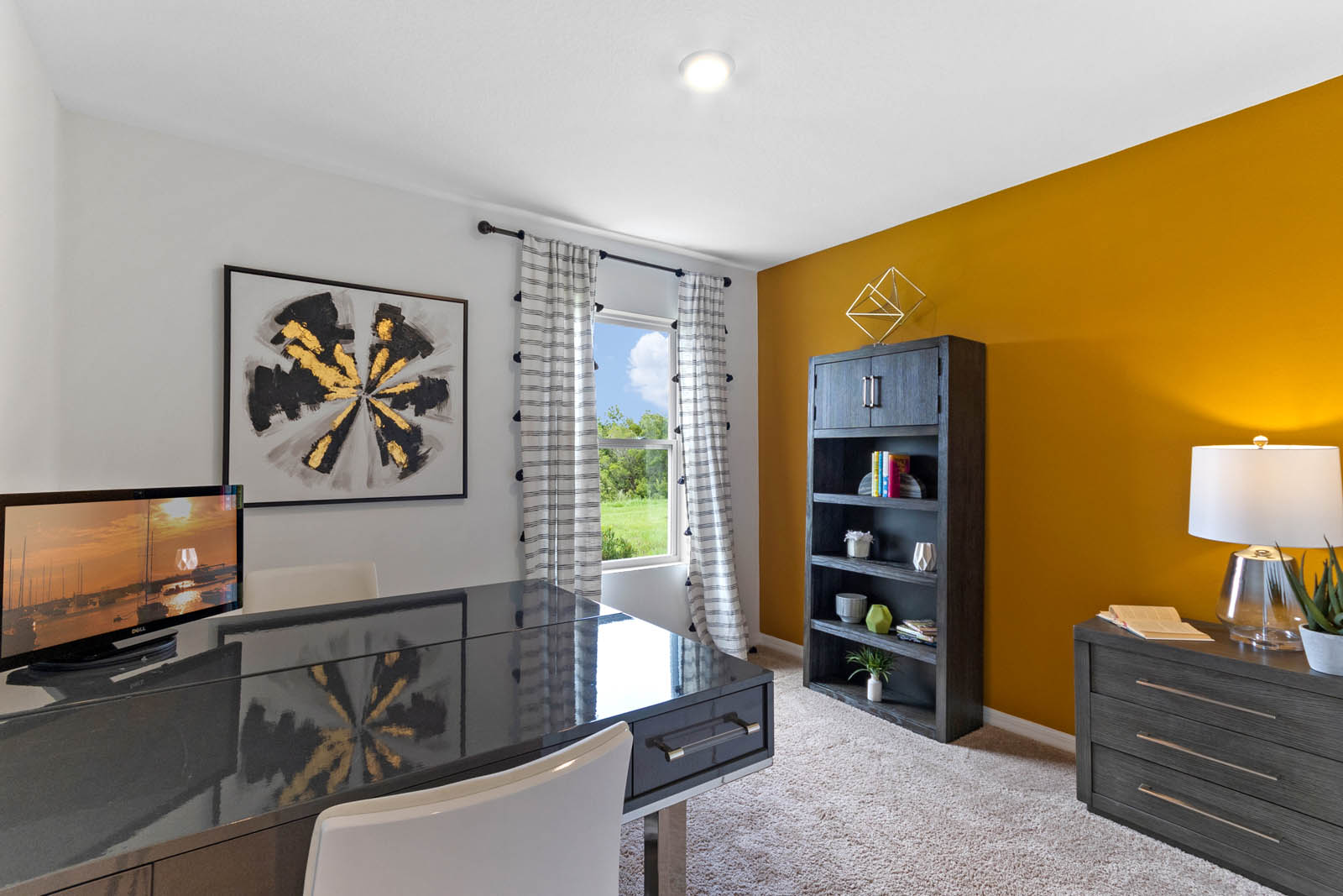 Office space with desk and book shelf