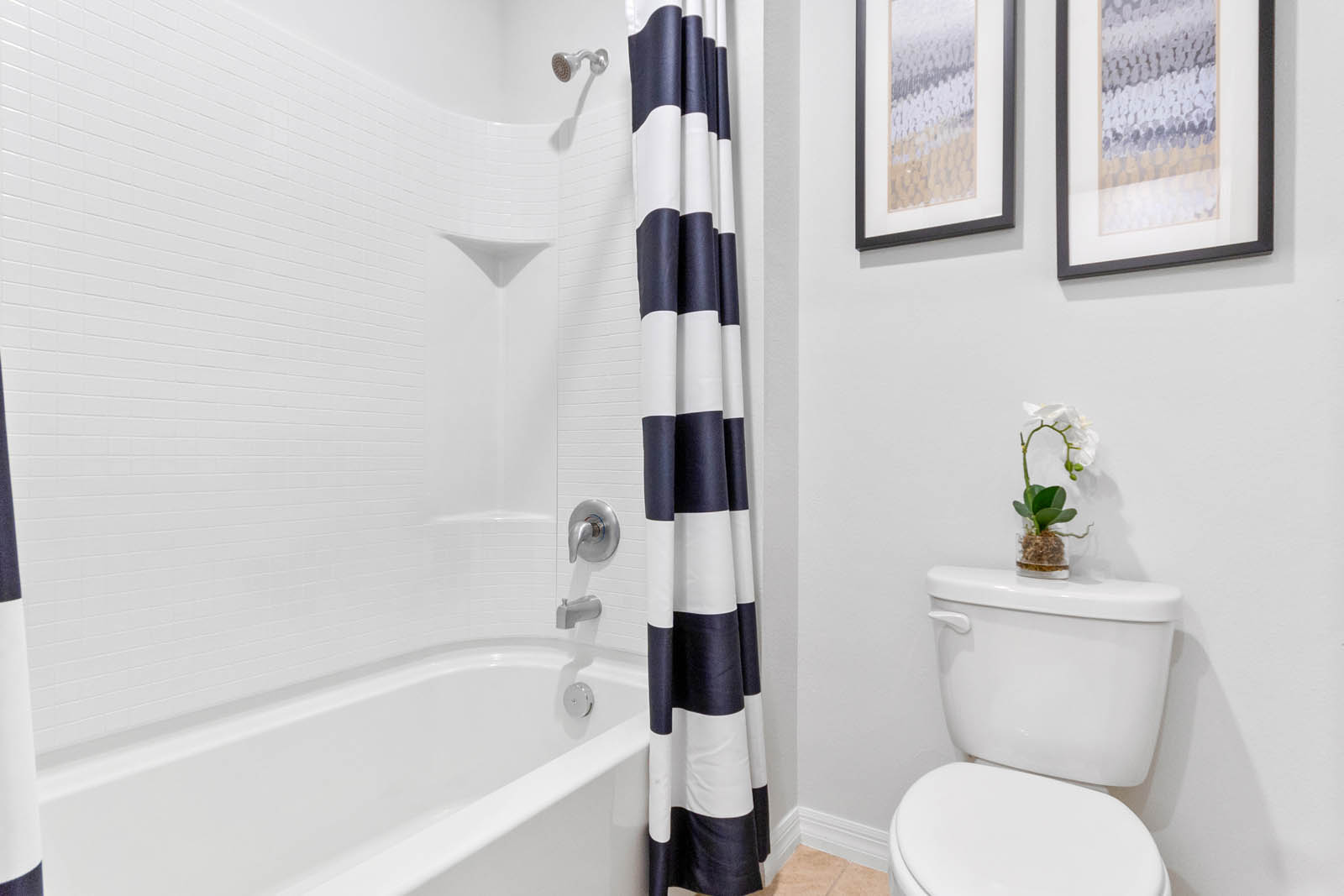 guest bathroom with tub and shower