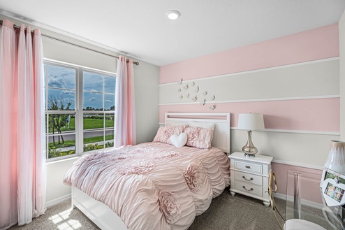 guest bedroom with carpet throughout the room