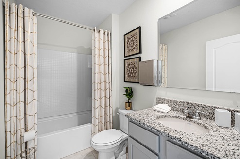 guest bathroom with tub