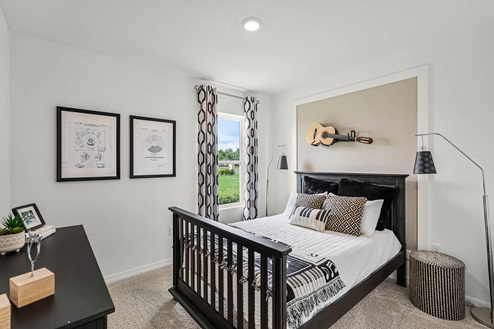 guest bedroom with small window facing the yard