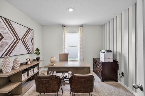 office space with desk and chairs