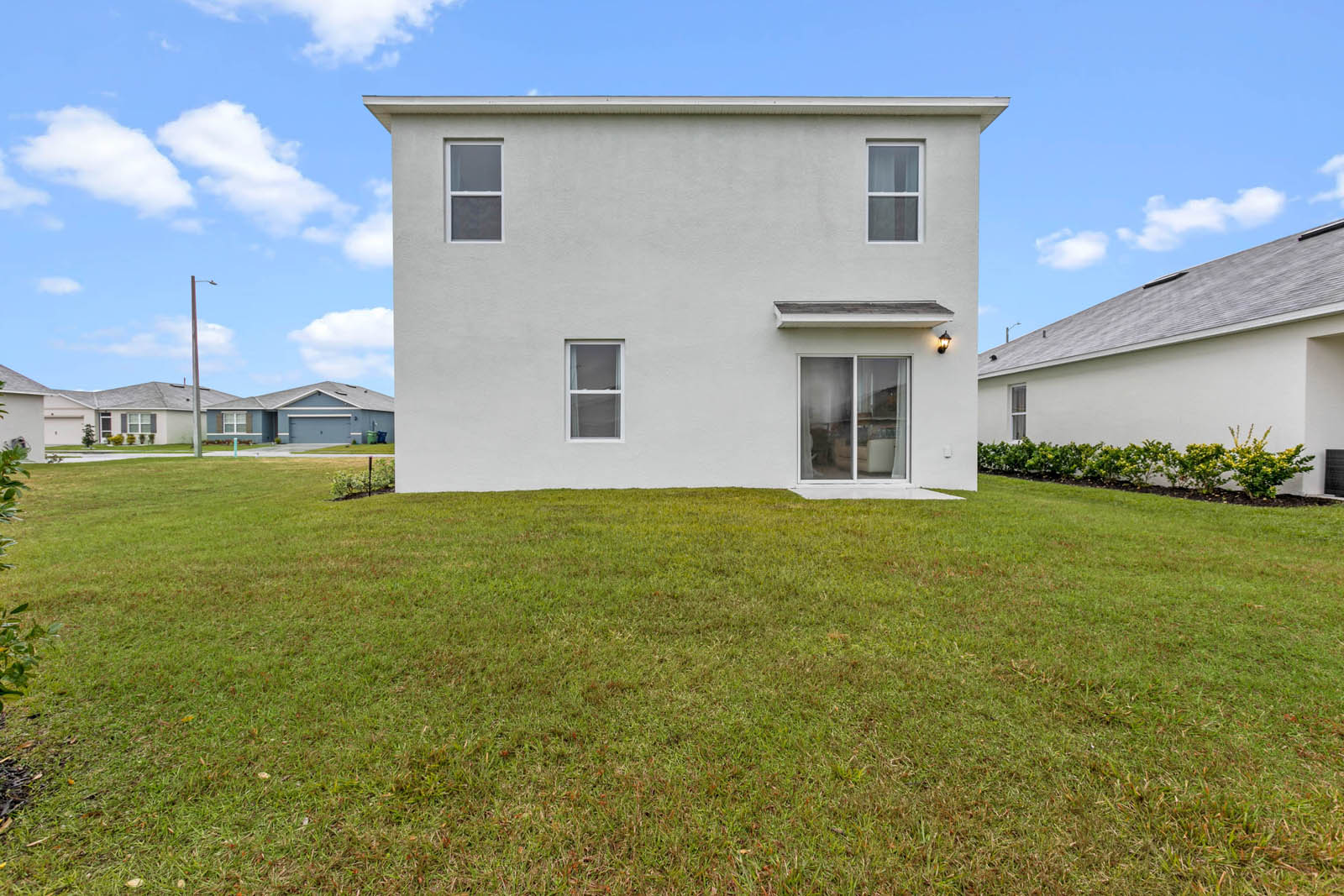 Two story home backyard