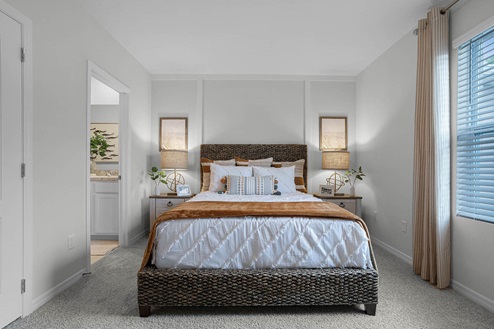 Guest bedroom with attached shared bathroom
