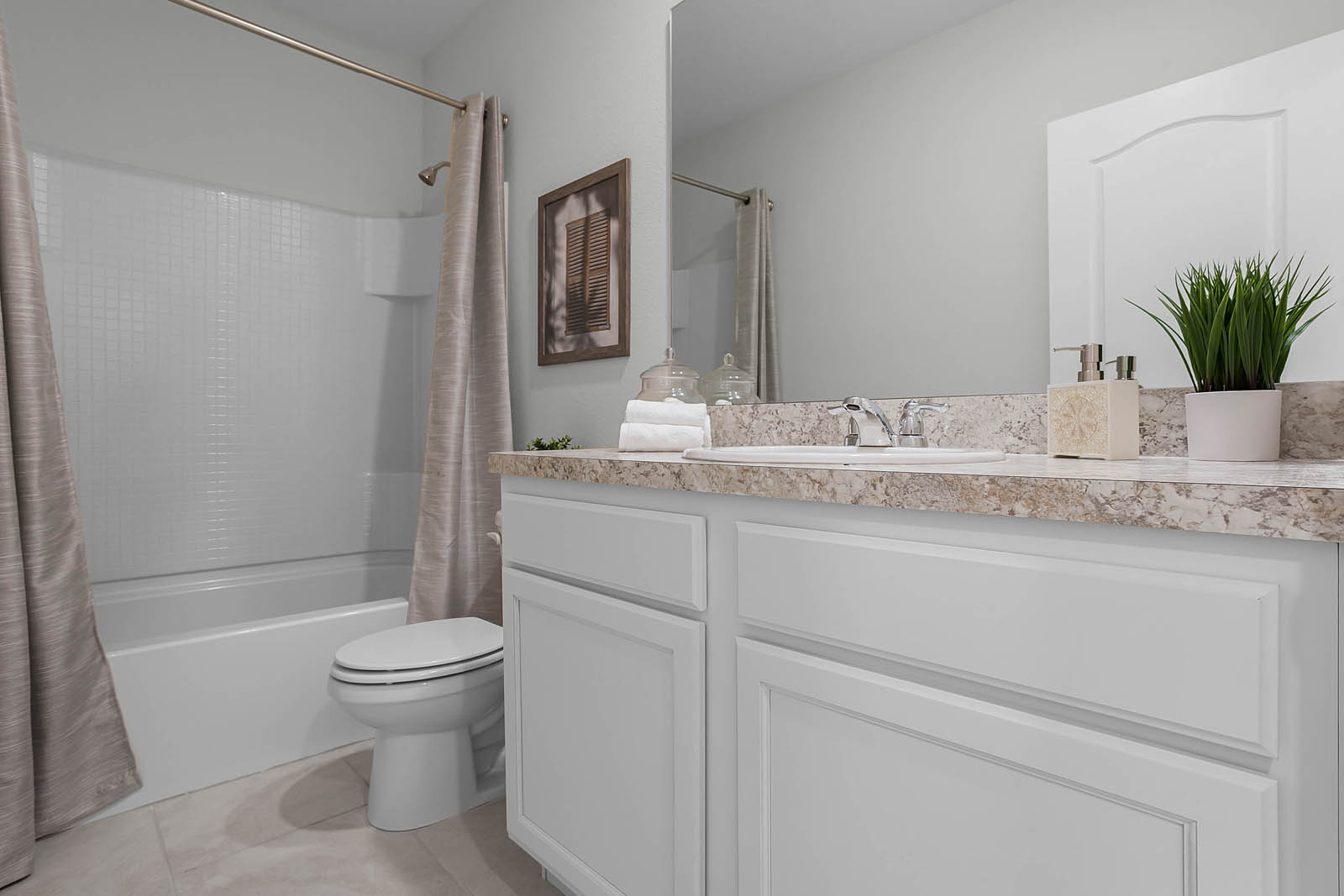 Upstairs guest bathroom with tub