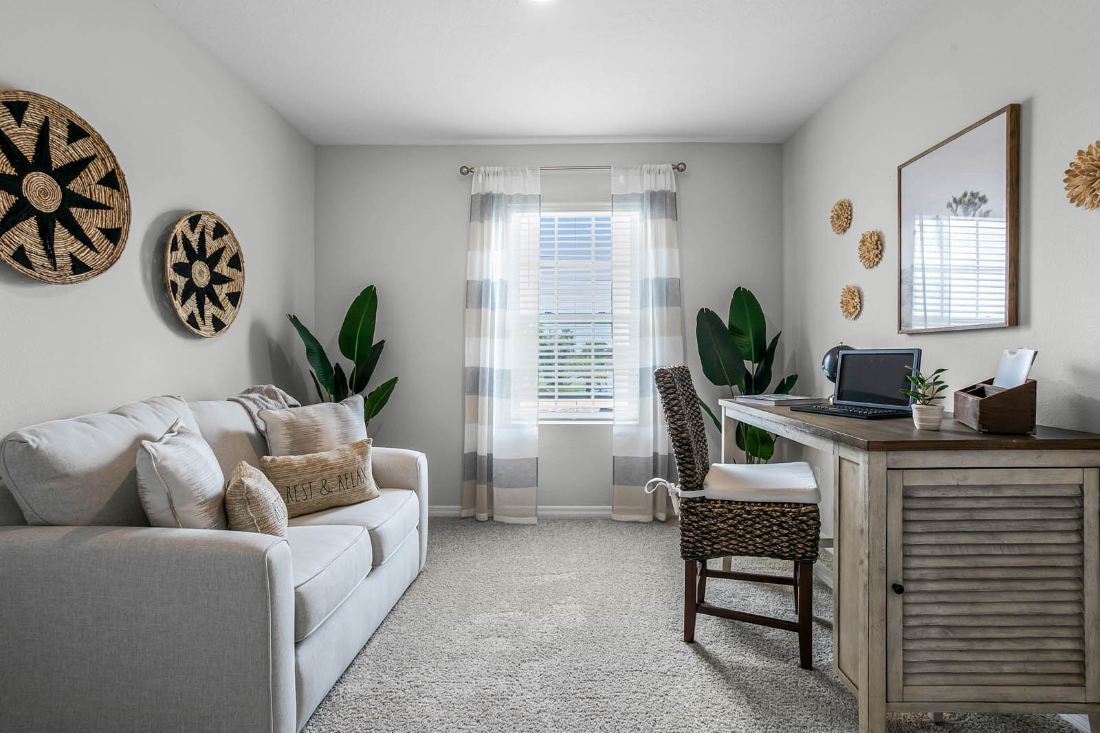 Office space with desk and couch