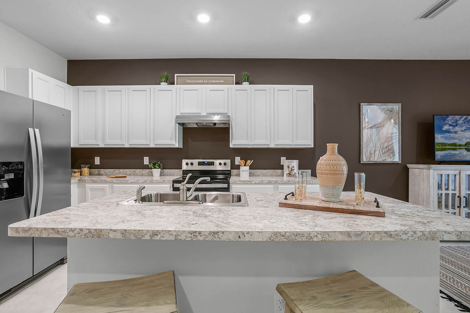 Kitchen with stainless-steel appliances and large island
