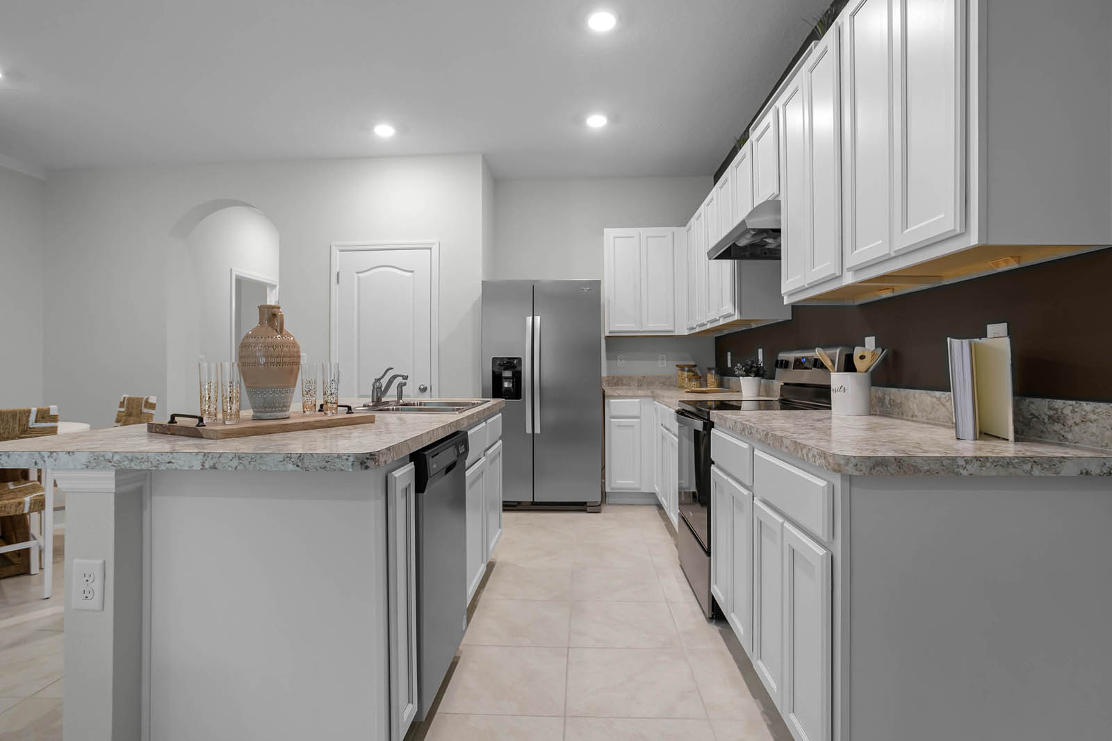 Kitchen with pantry and stainless-steel appliances