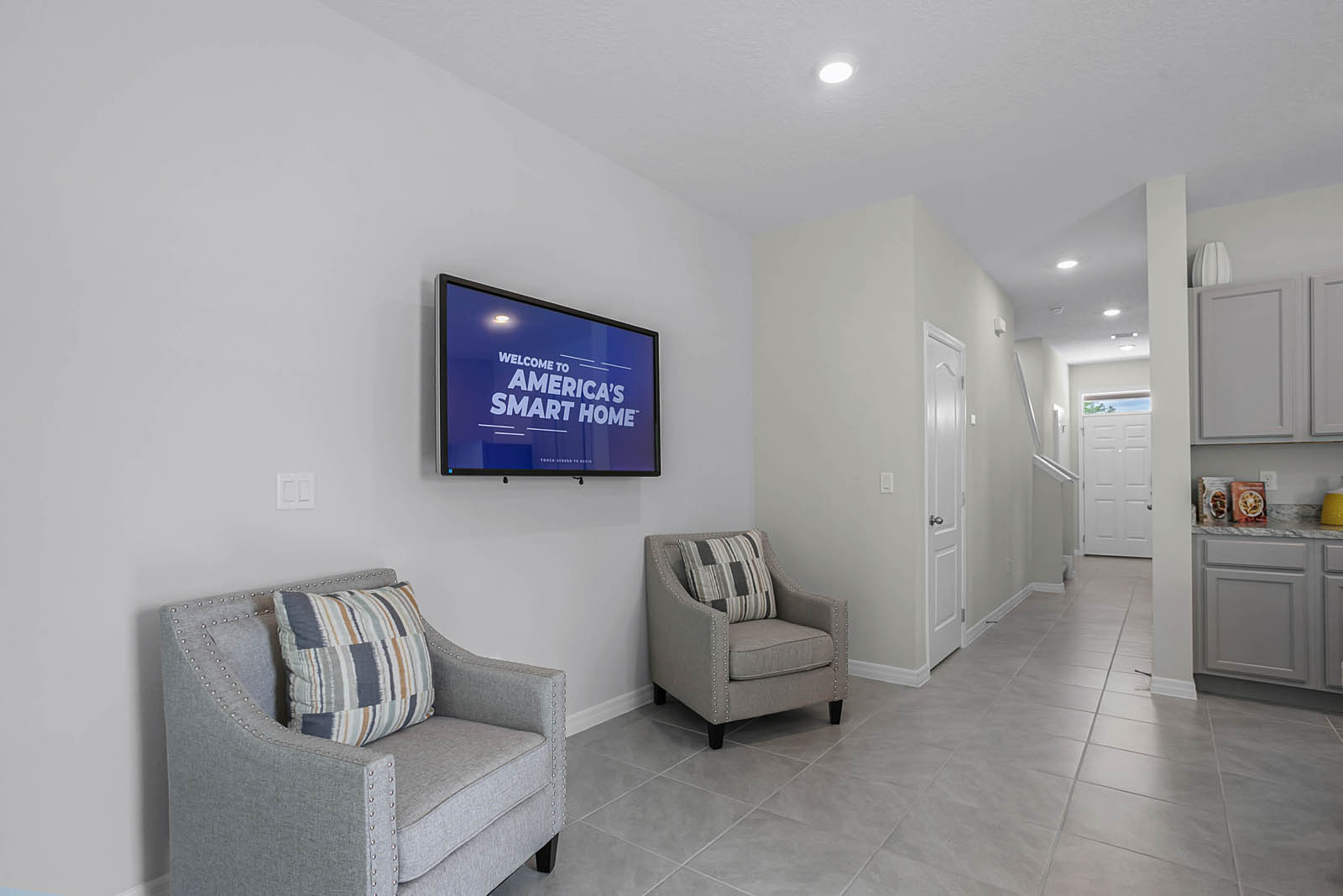Great room staged as an office with seating for sales center