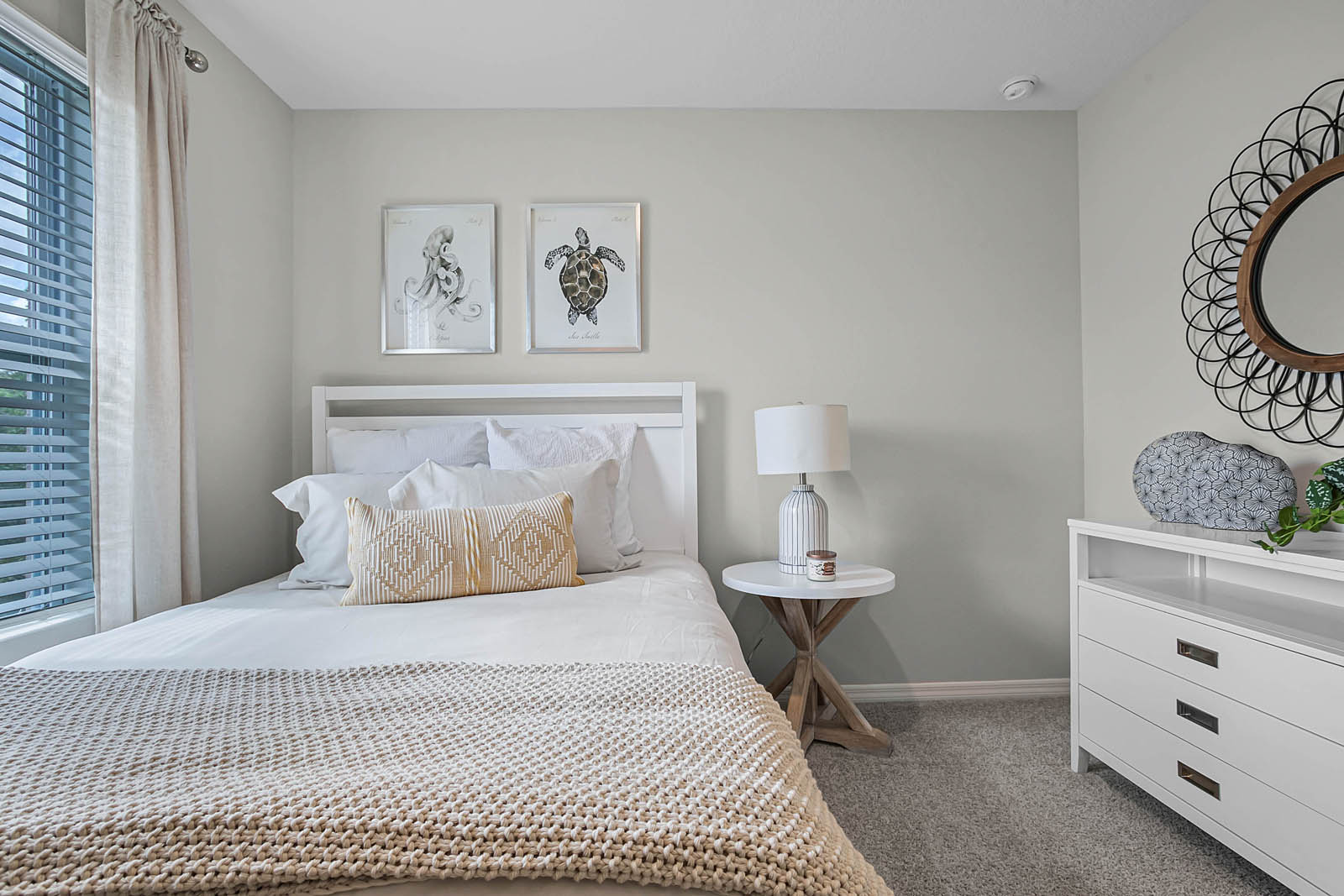 Guest bedroom with full size bed and dresser