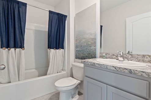 Guest bathroom with tub