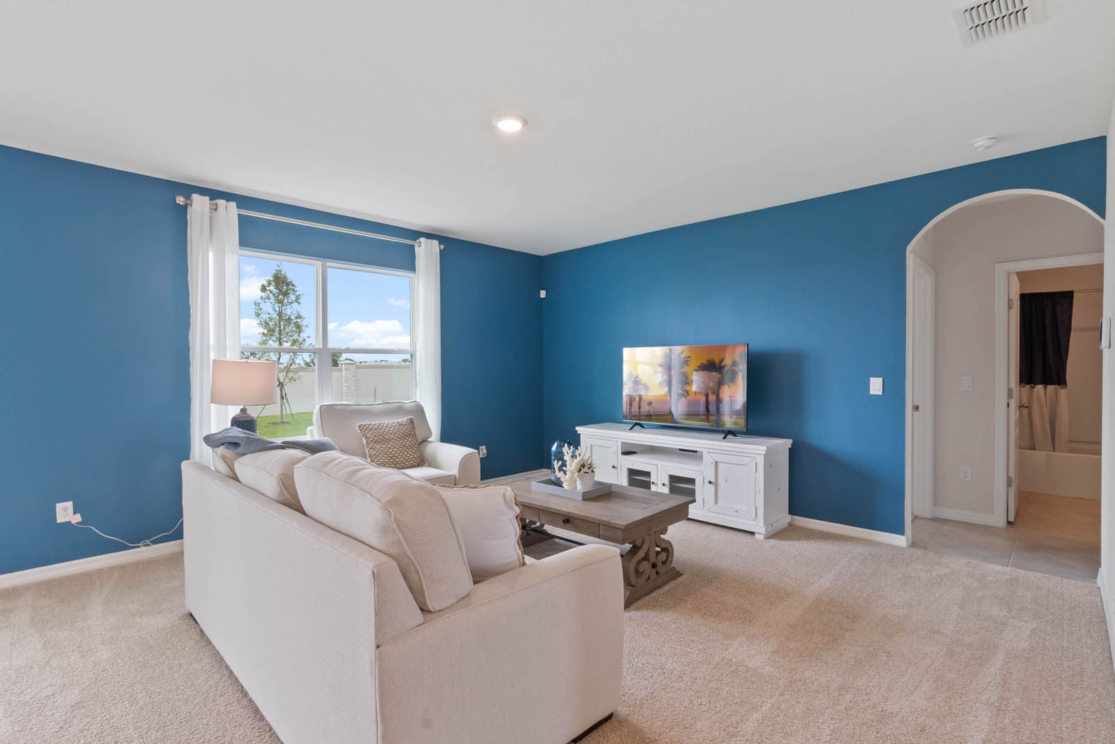 Living room leading to the guest bedroom