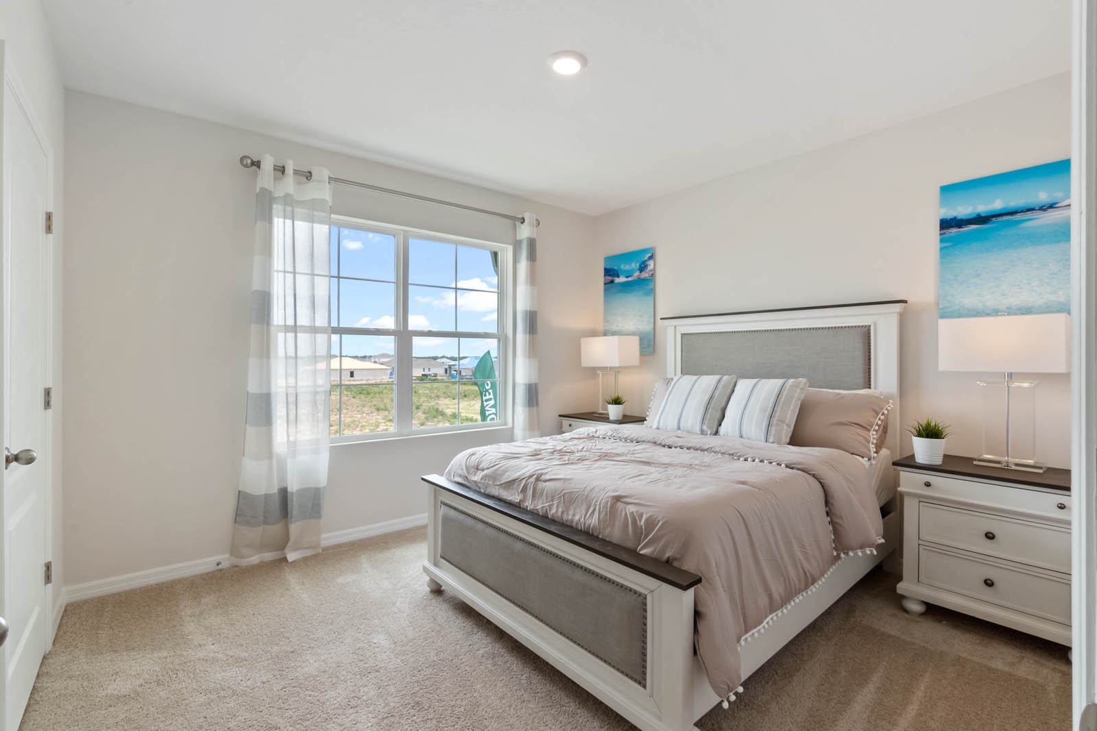 Guest bedroom with carpet throughout