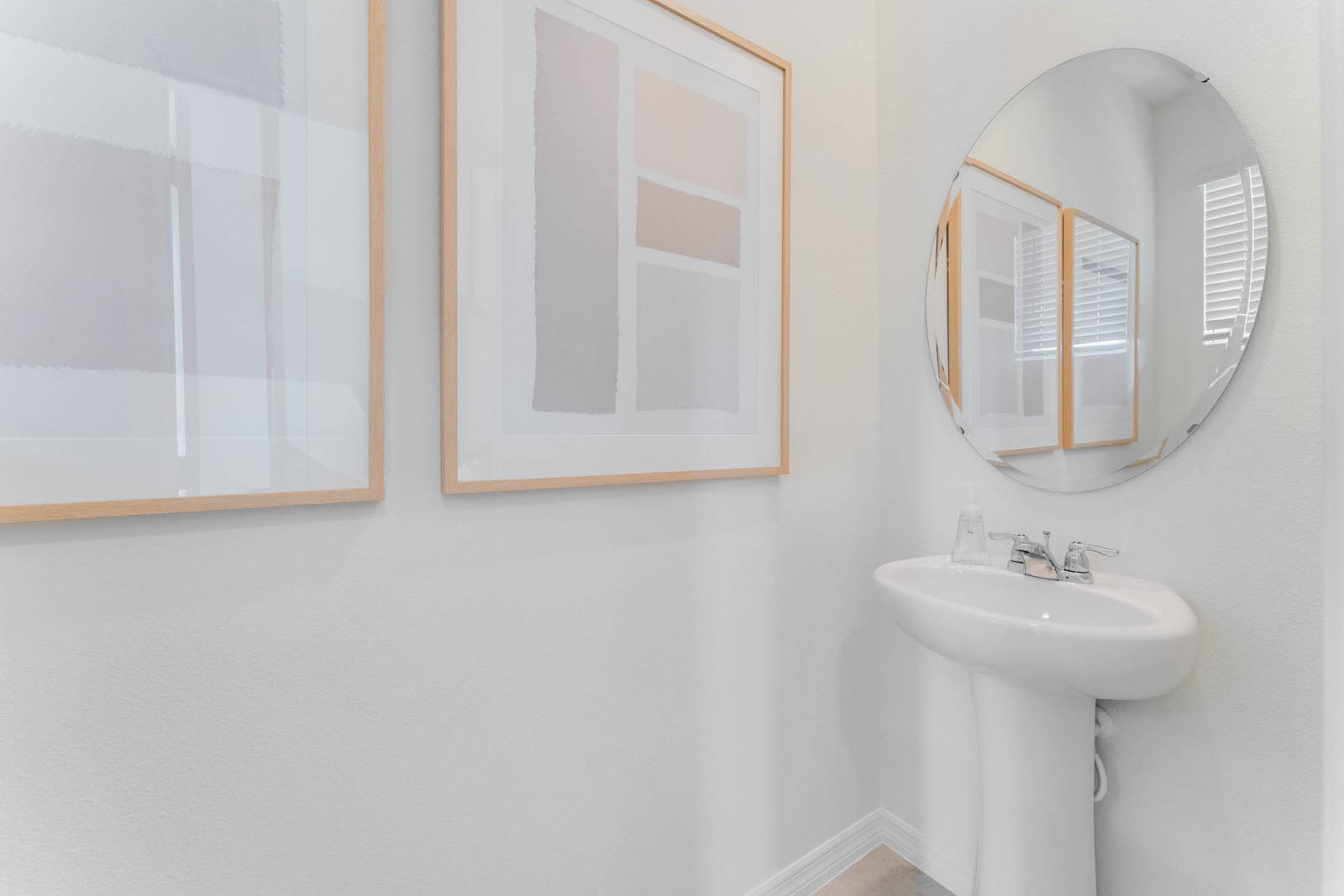 Downstairs half bathroom with toilet and sink
