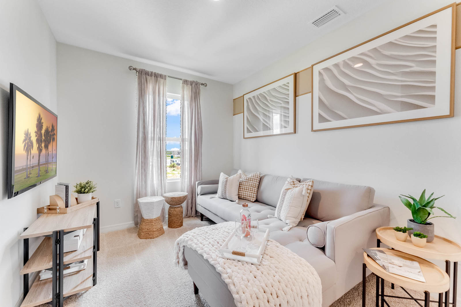 Upstairs loft with sectional and tv