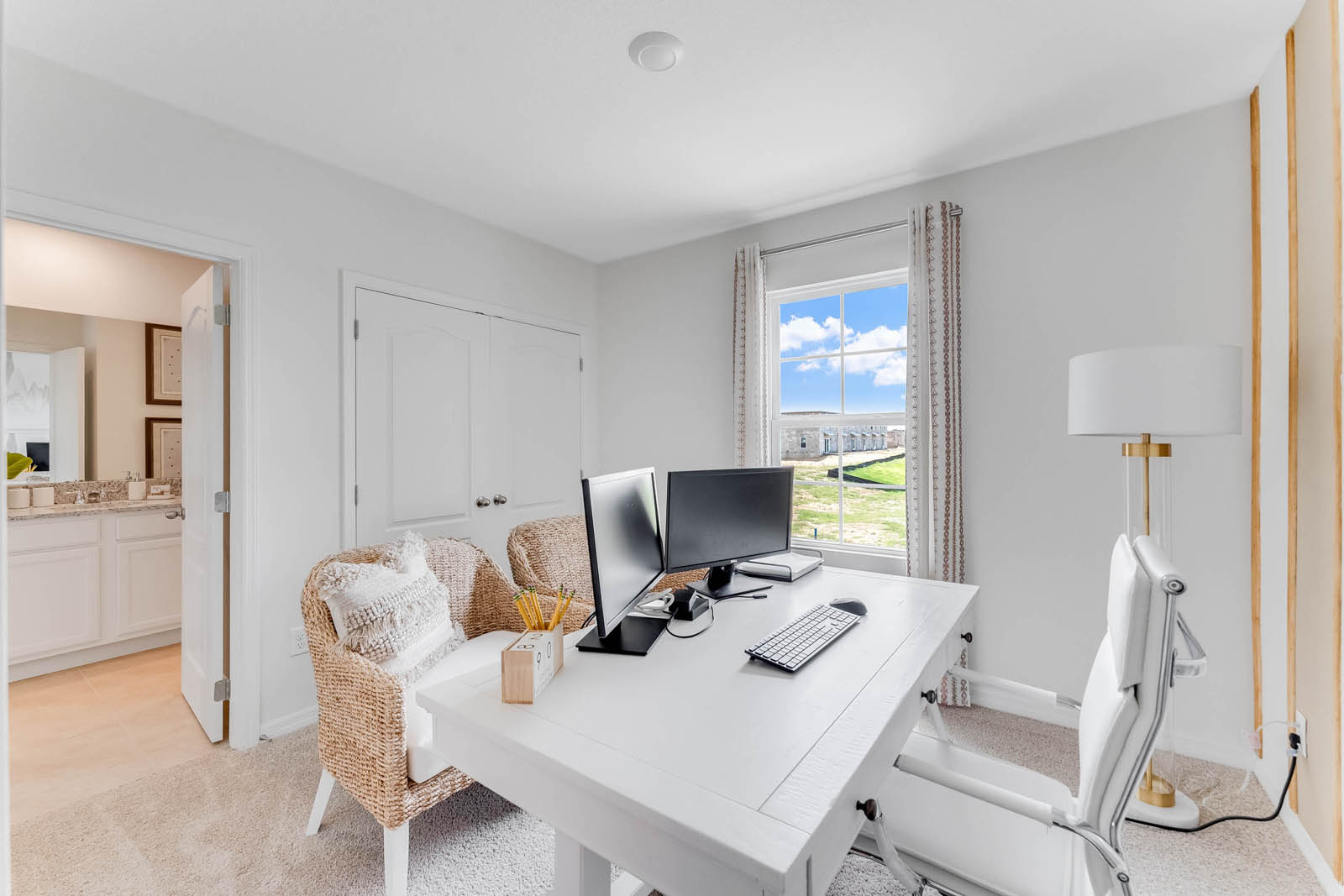 Upstairs office with attached shared bathroom