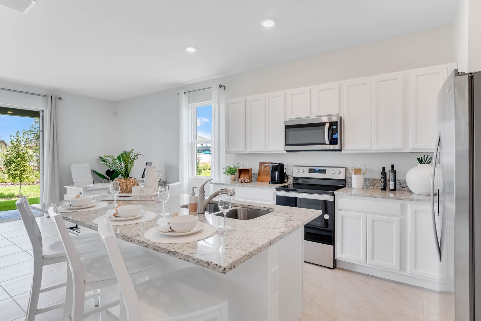 Open concept kitchen with large island and eating space