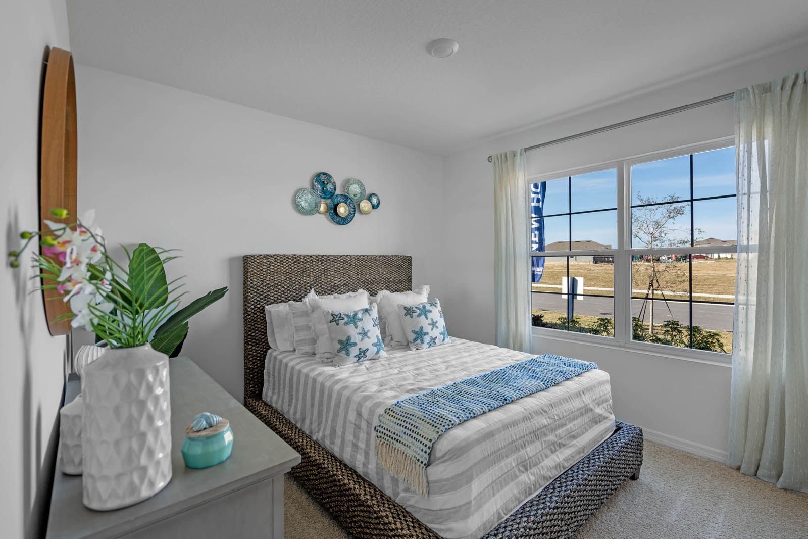 guest bedroom with carpet throughout the room