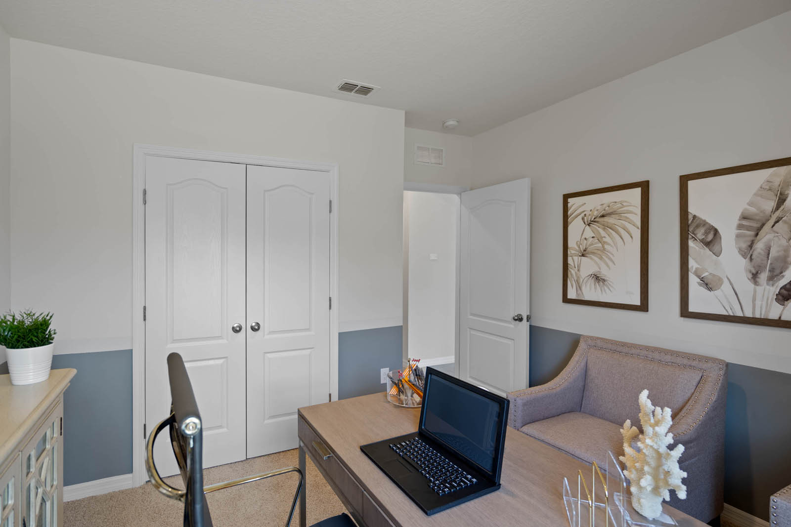 view of inside of the office with closet space