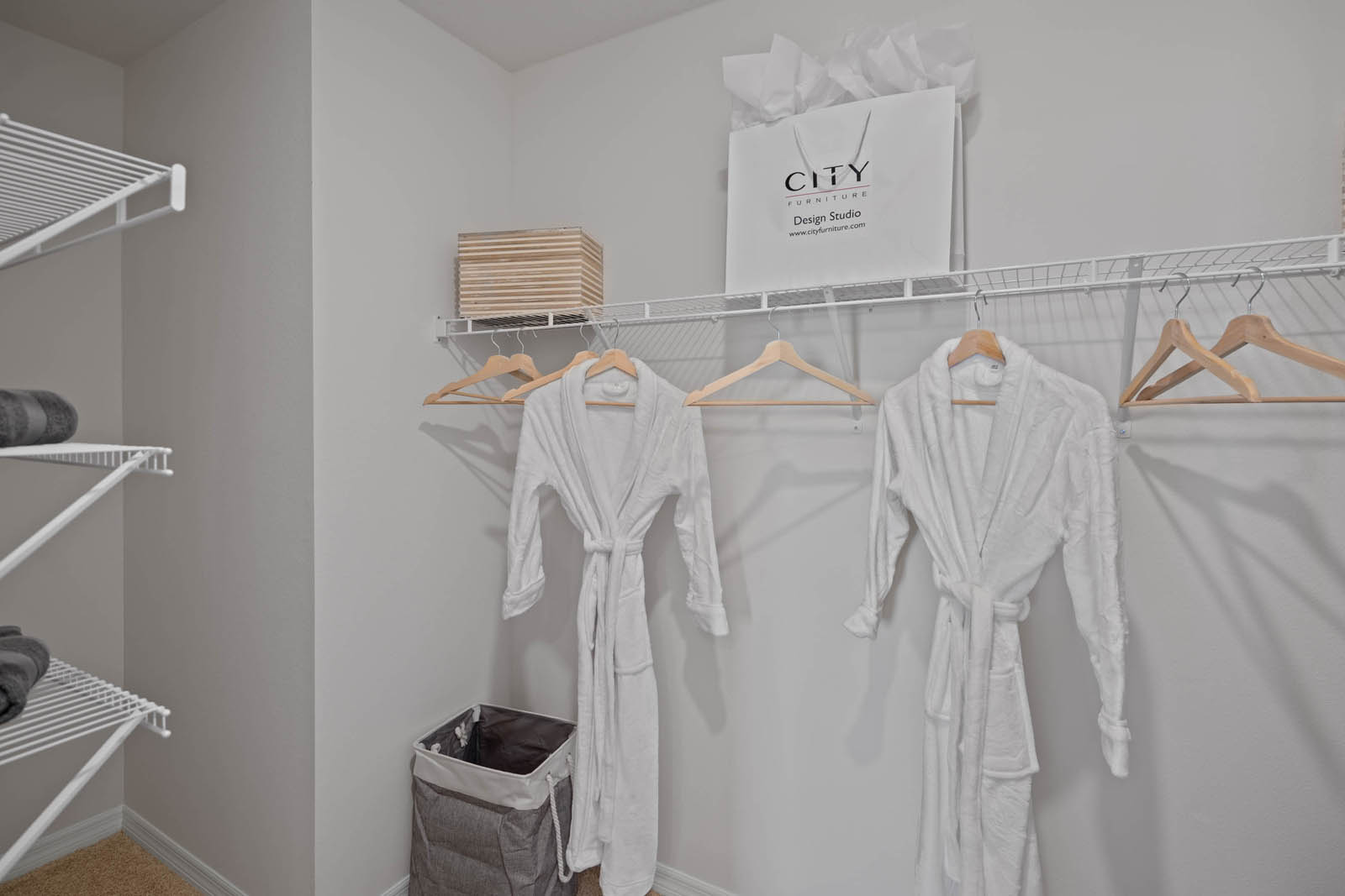 Walk in closet with carpet throughout