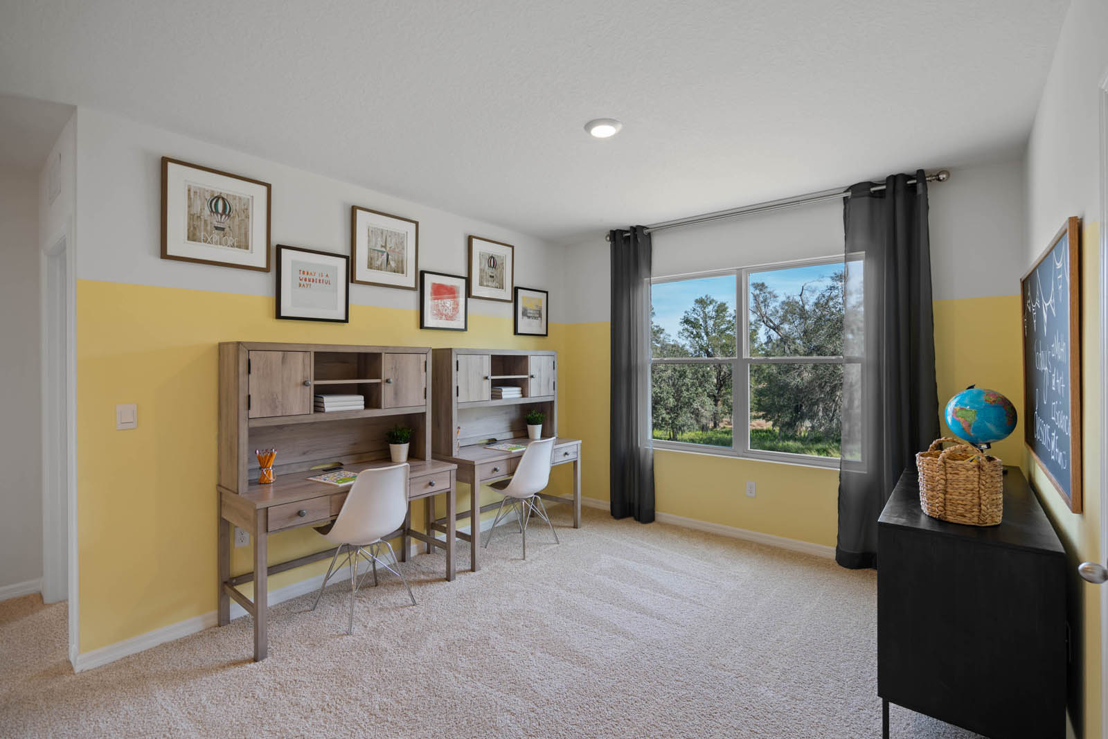 upstairs Loft area with 2 desks and carpet throughout