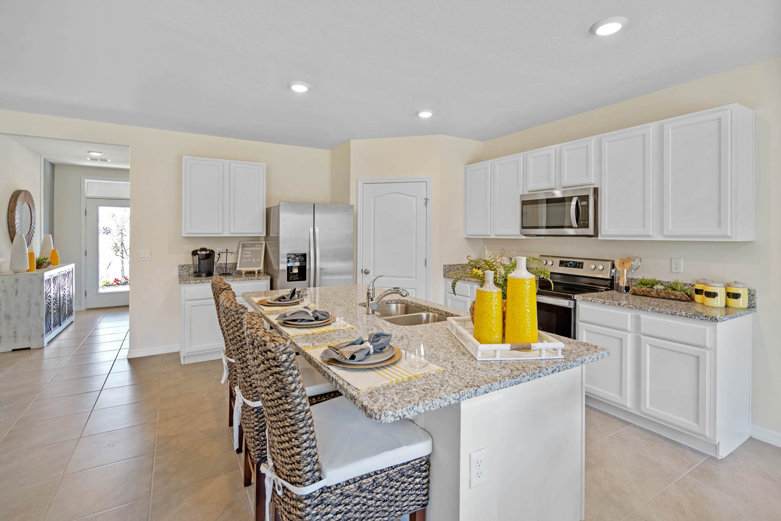 Kitchen with island and barstools