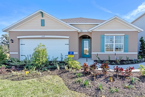Exterior single family home with two car garage