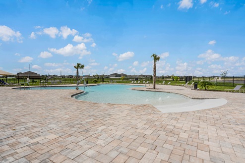 Pool with a beach entrance