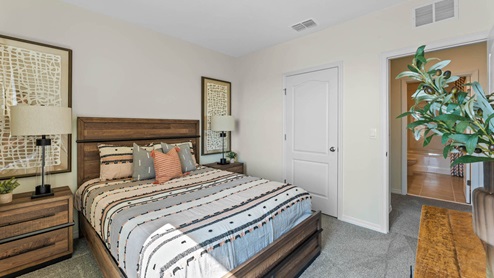 Guest bedroom with full size bed