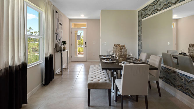 Entry way of the home with hallway leading to the guest bedrooms