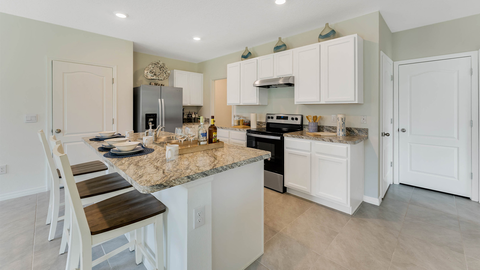 Kitchen island with stools side view