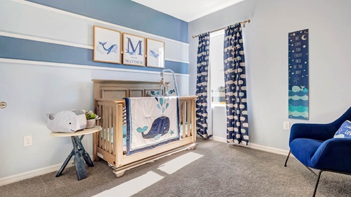 Guest room decorated as nautical nursery
