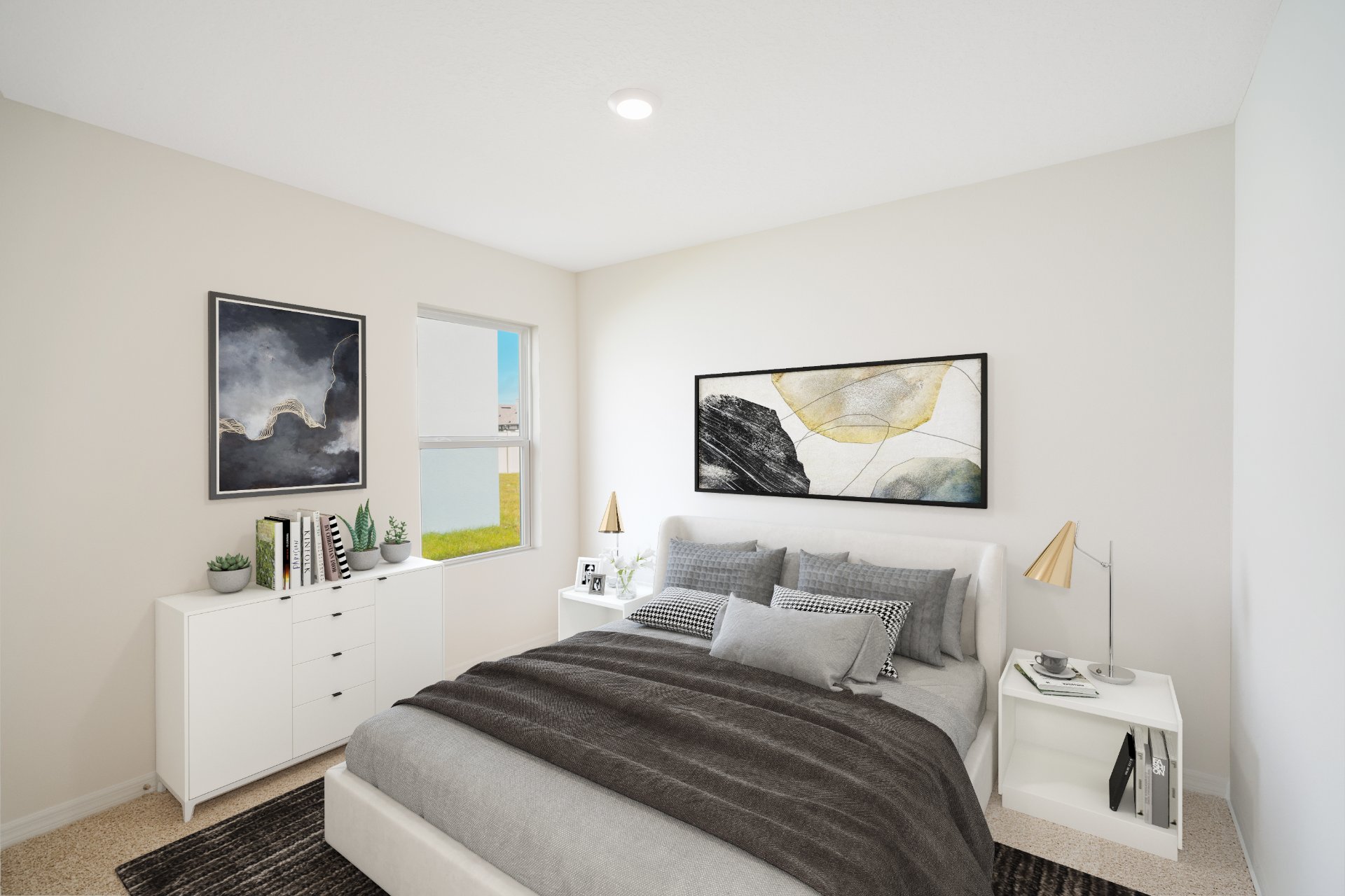 Guest bedroom with a vanity under the window.