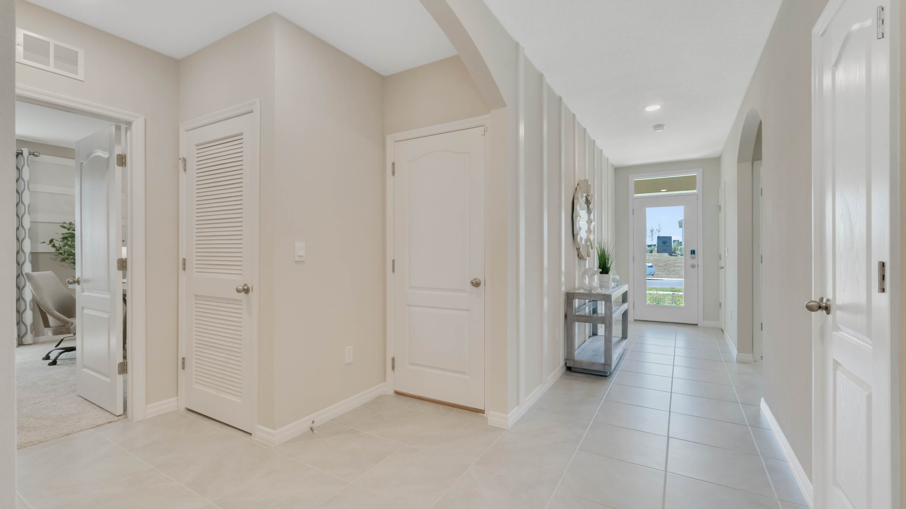 Hallway to the garage and third bedroom