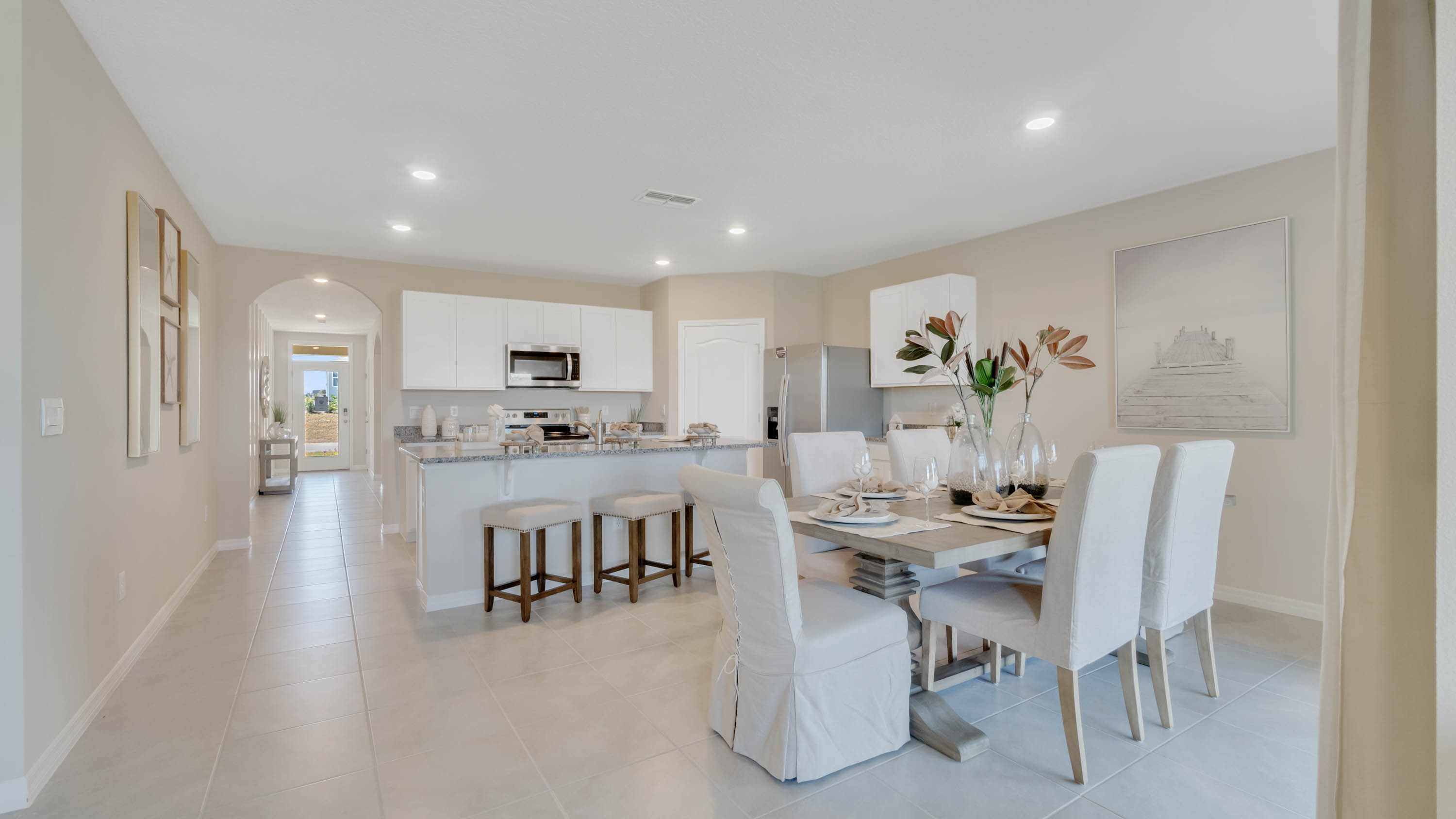 Dining room table adjacent to the Kitchen Island