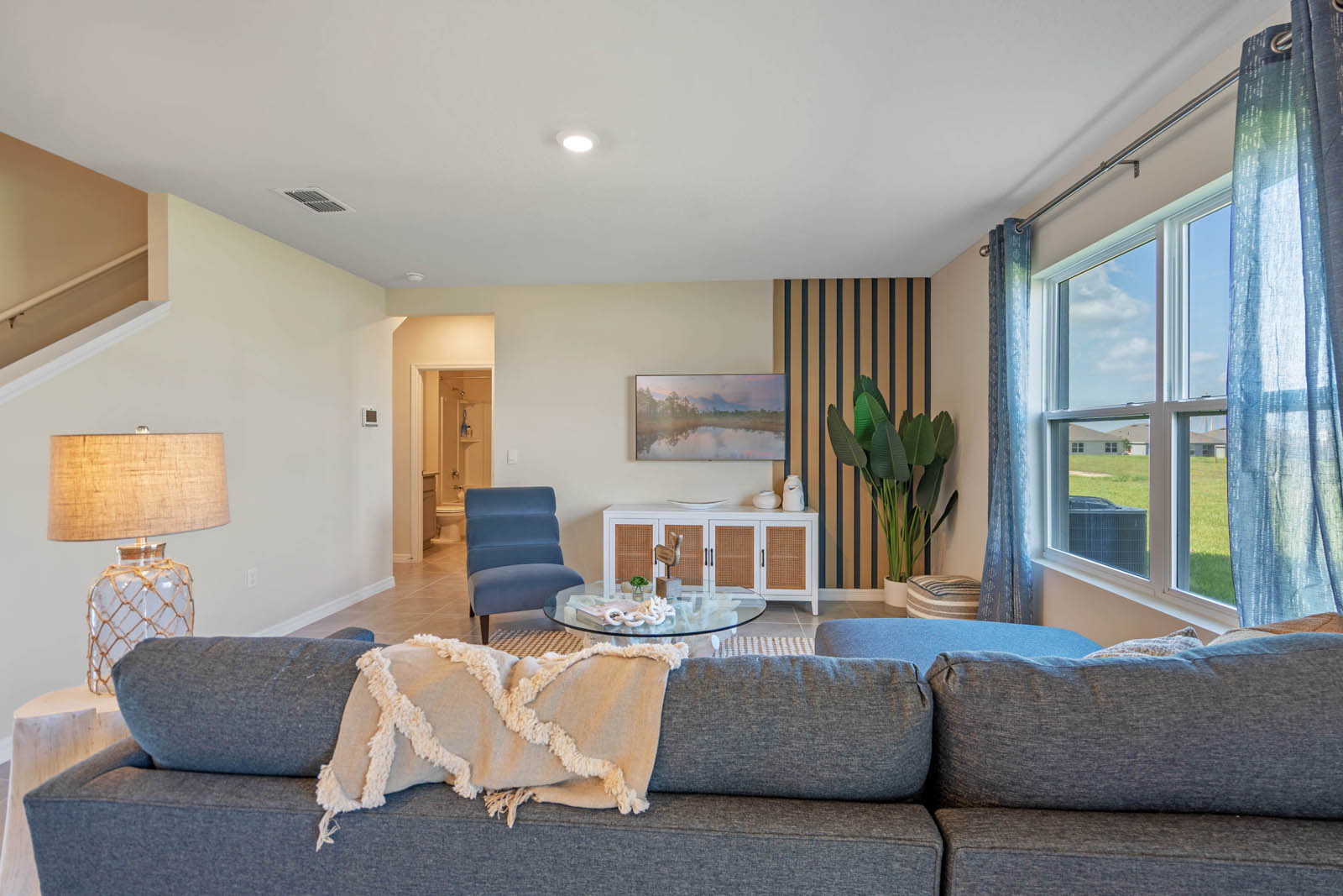 Living room with stairs to the left