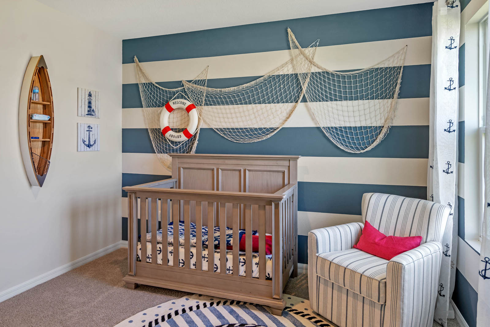 Guest room decorated as nautical nursery