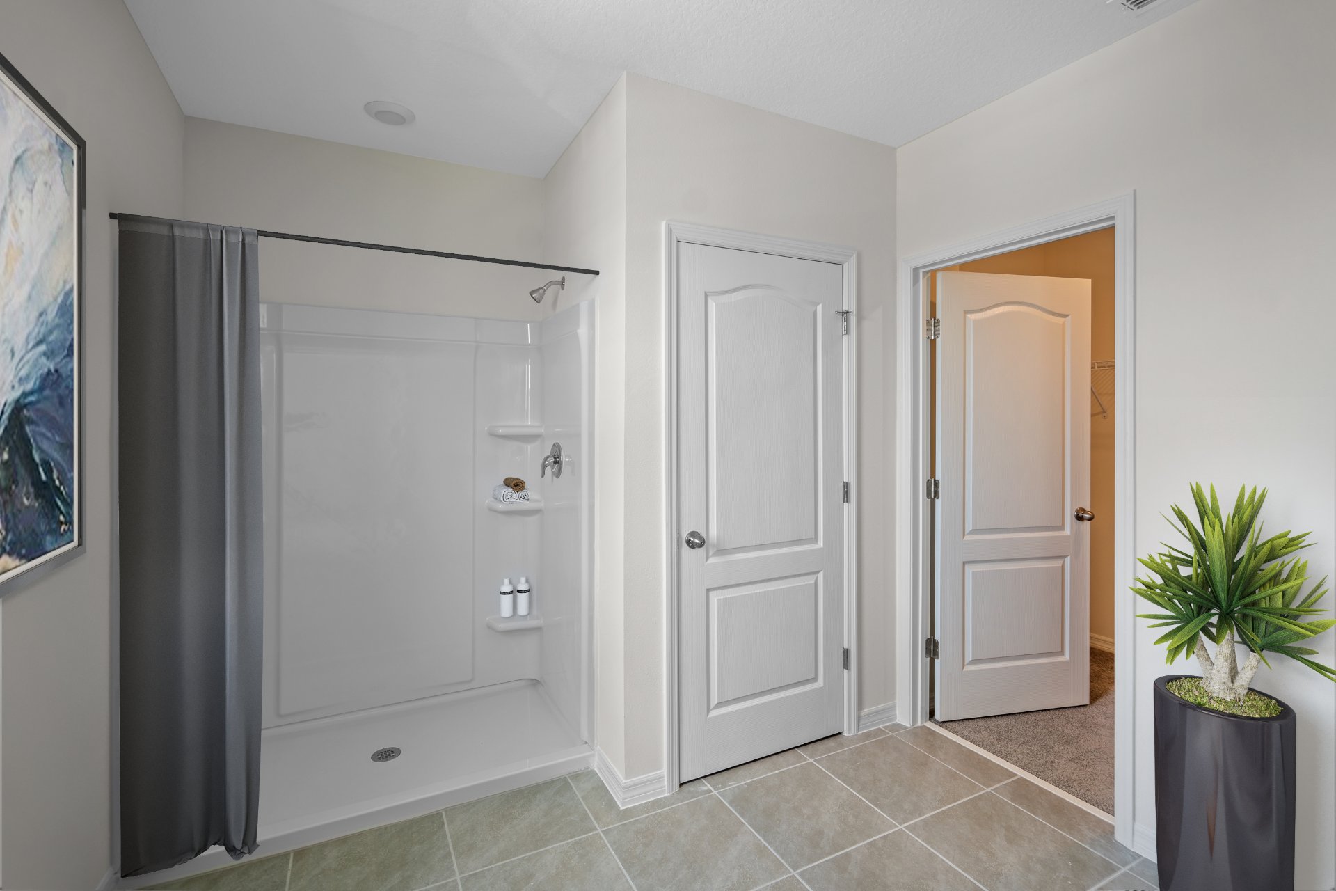 Virtually staged primary bathroom with walk in shower