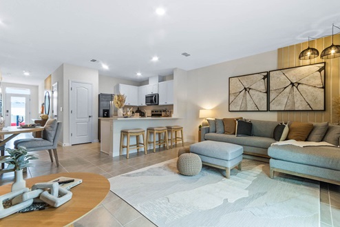 Open concept main floor living room, dining room, and kitchen