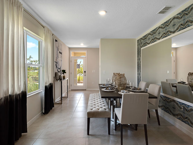 Hallway to kitchen with dining room on the left
