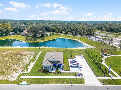 Aerial view of the model home on the lake