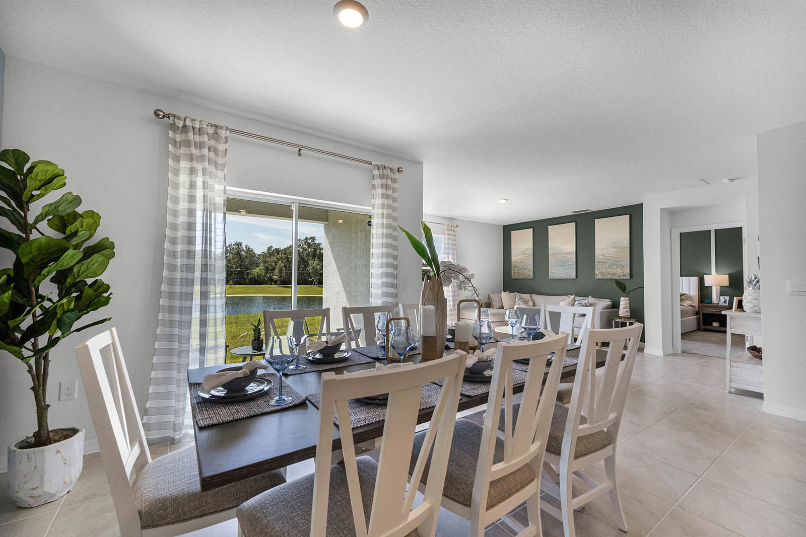 Dining room area with the sliding glass door behind.
