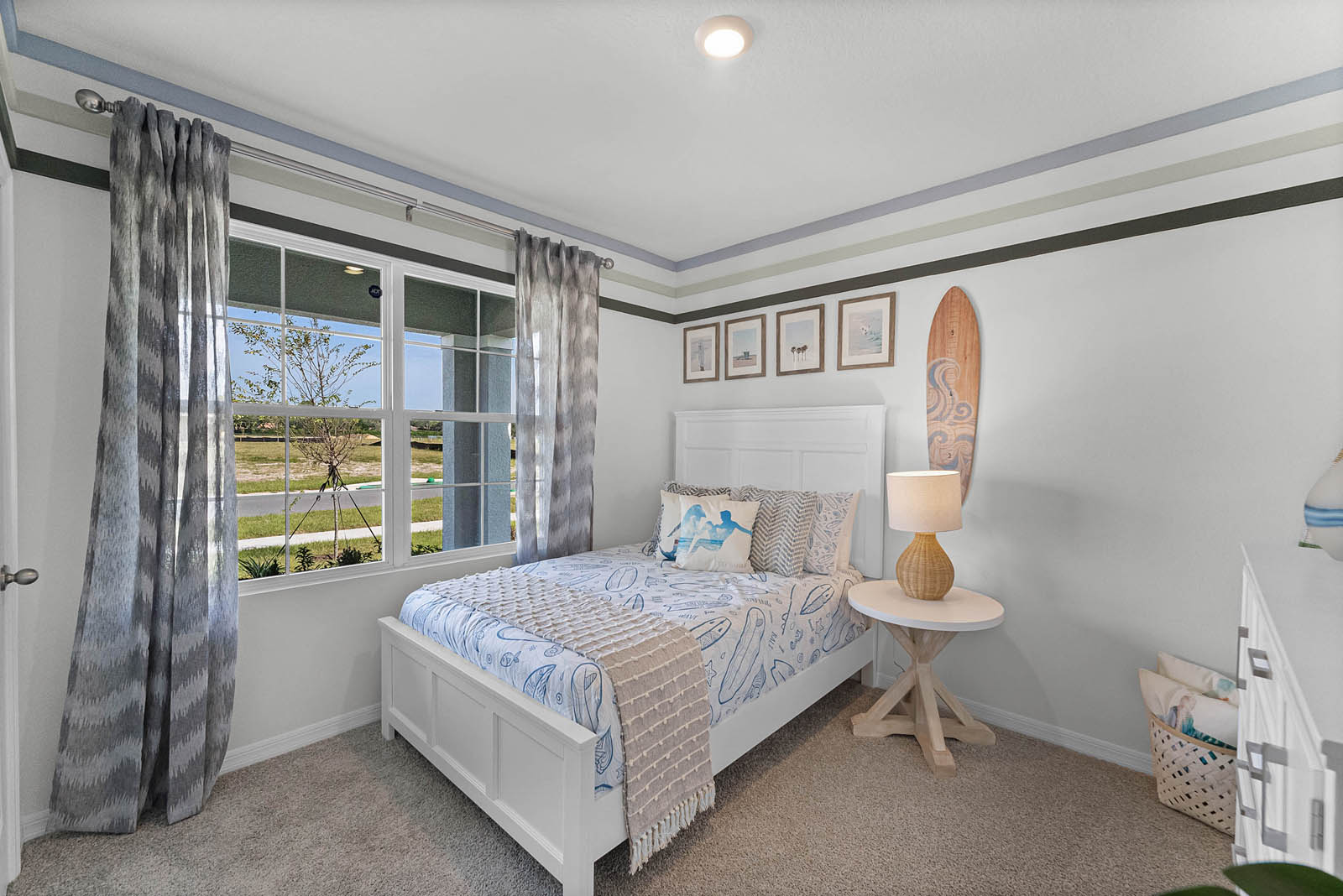 guest bedroom with window facing the front of the home
