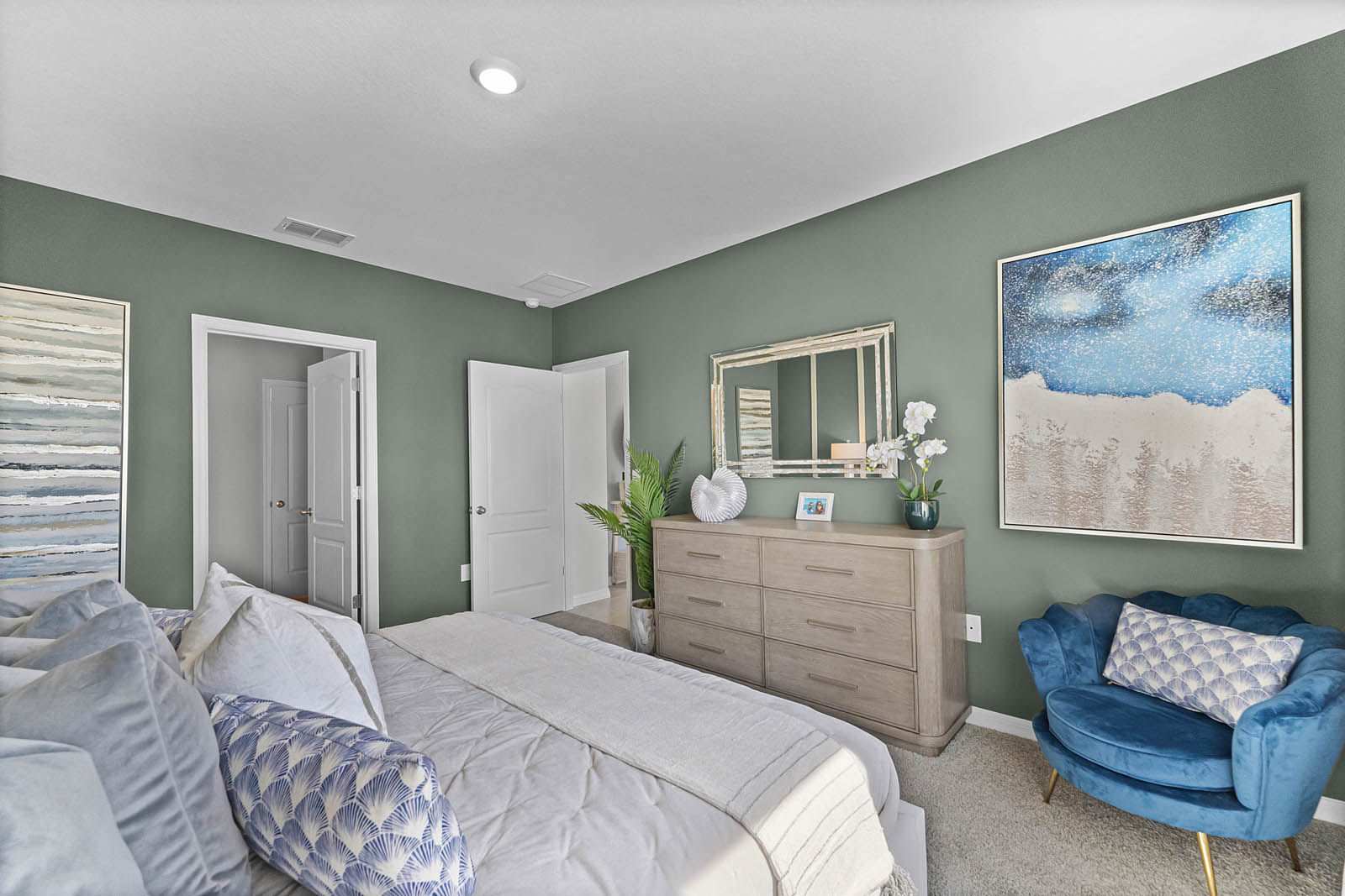 Primary bedroom with door into the primary bedroom