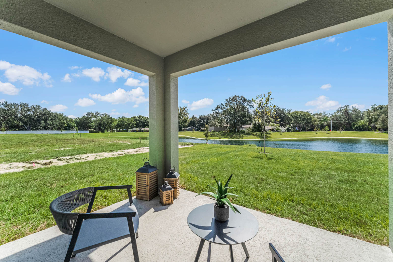 Covered patio with view of the lake
