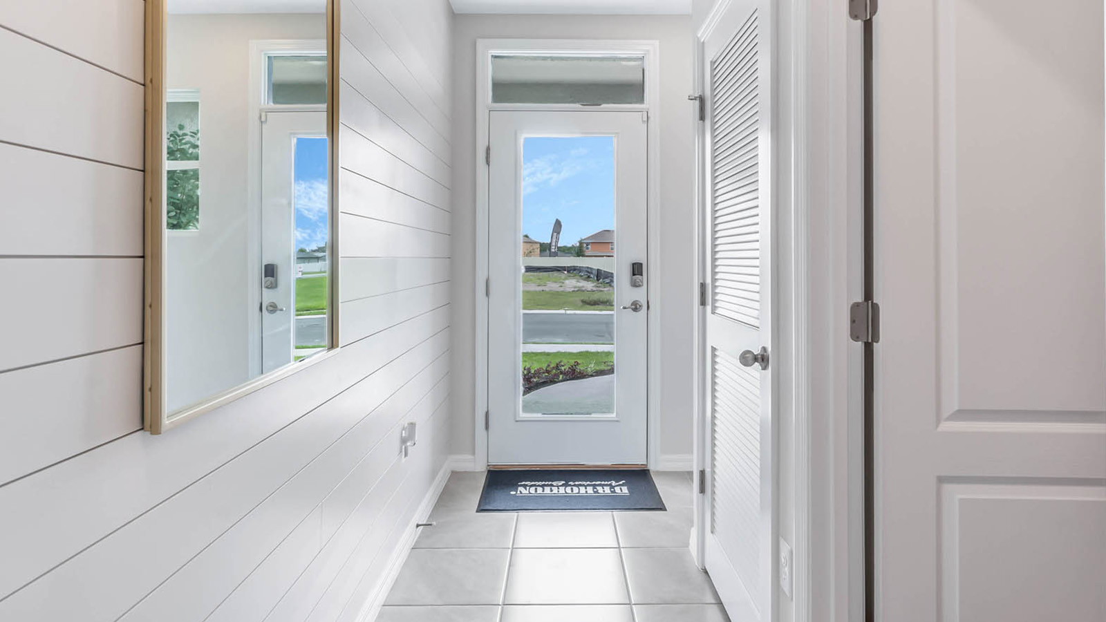 Entry hallway to bedrooms and open concept living areas