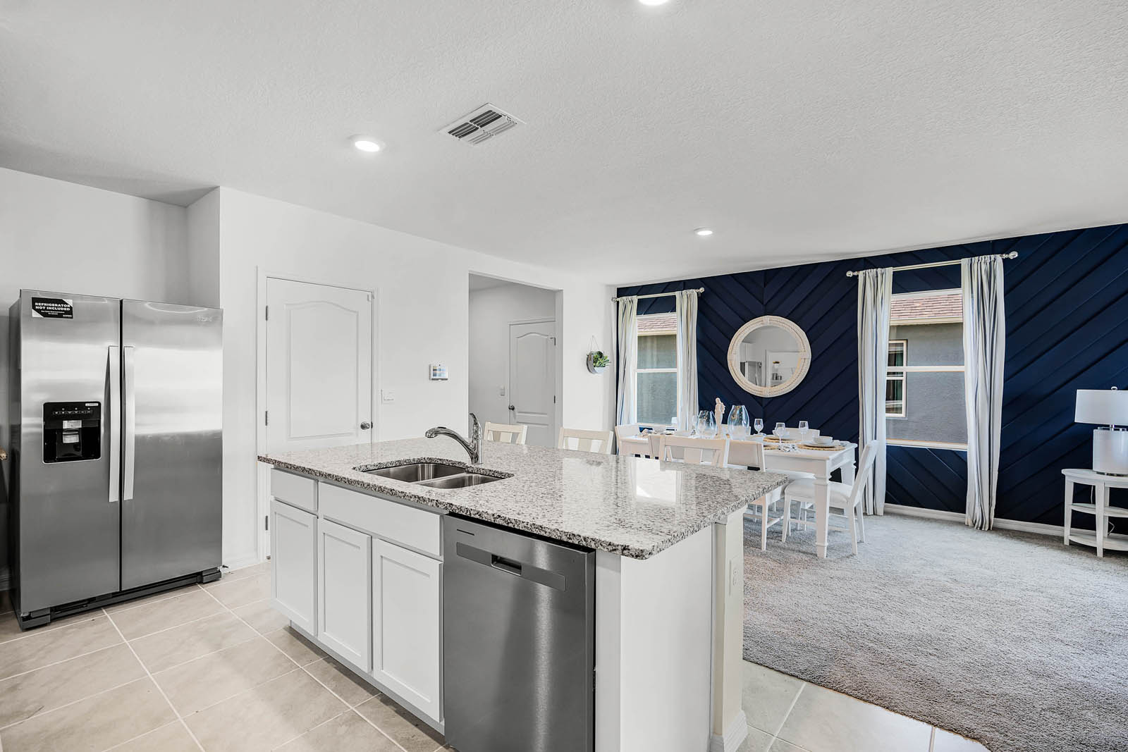 Kitchen island near the dining room table