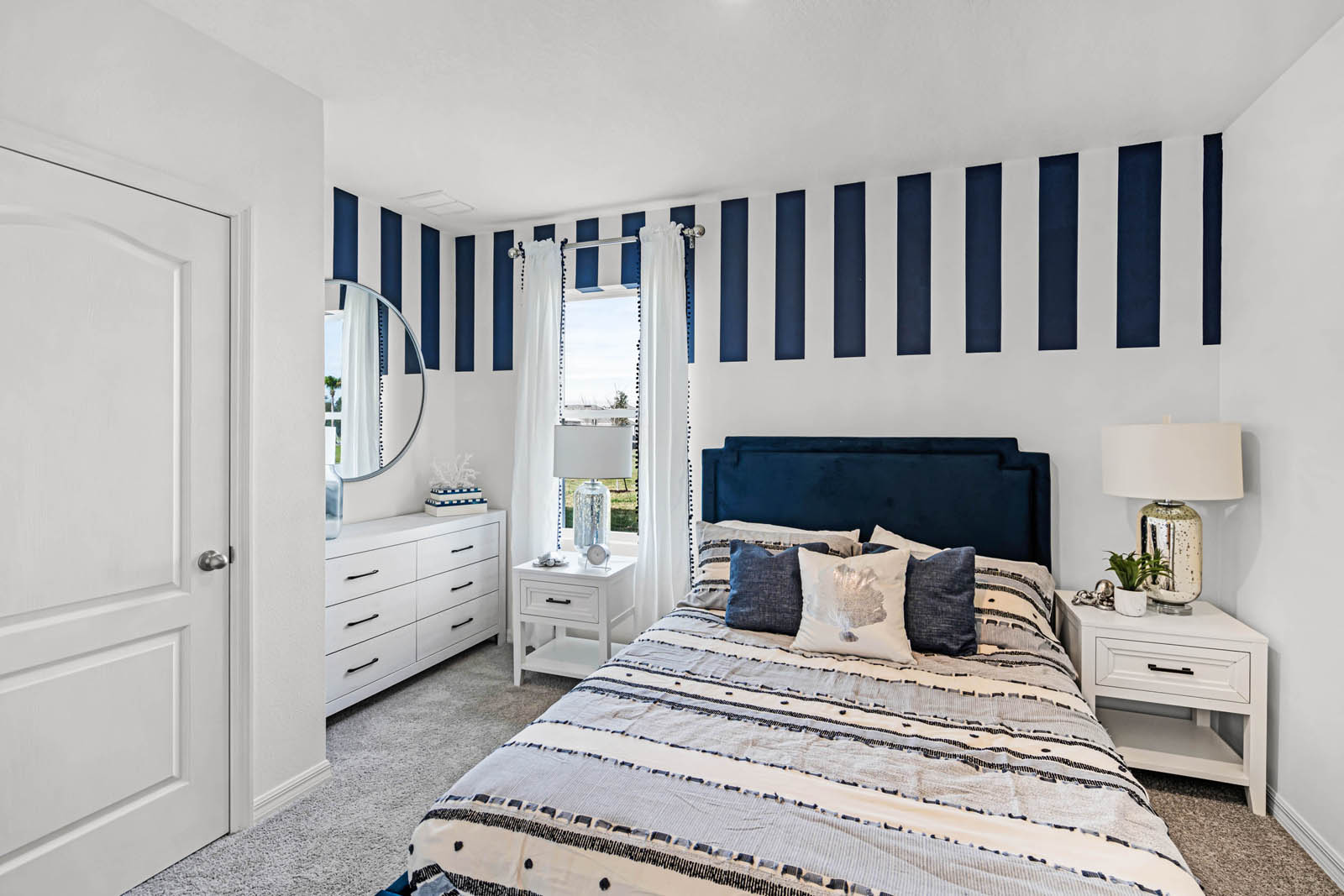 downstairs bedroom with carpet throughout