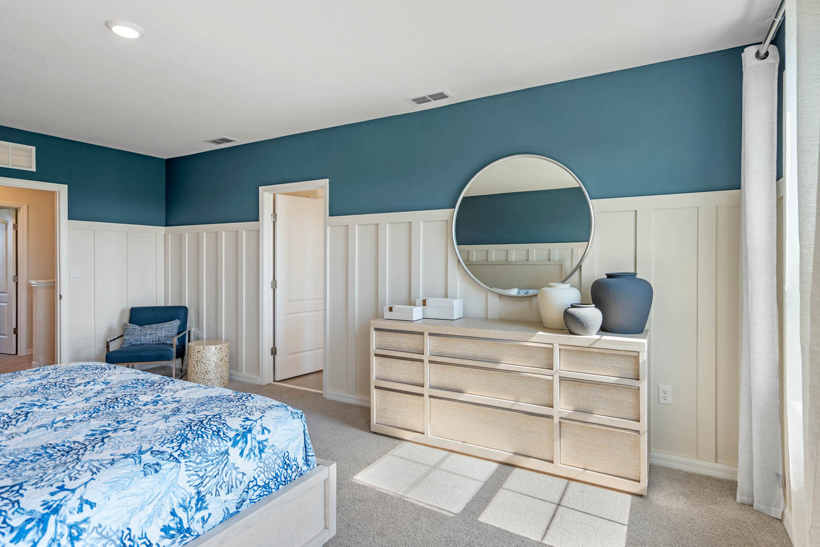 Primary bedroom with vanity